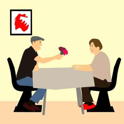 日期 晚餐 给予 花 卡通人物 主意 成熟 男人 坐着 表