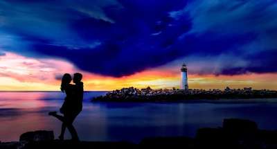 日落 灯塔 夫妻 海滩 爱 浪漫 景观 蓝天 蓝色的爱