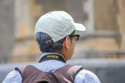 摄影师 男人 尼康 街头摄影 帽